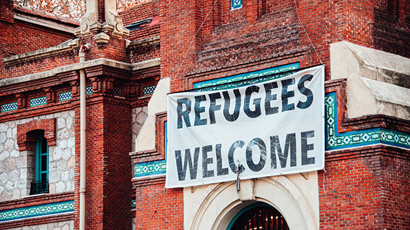 Cartel de Bienvenida a los Refugiados